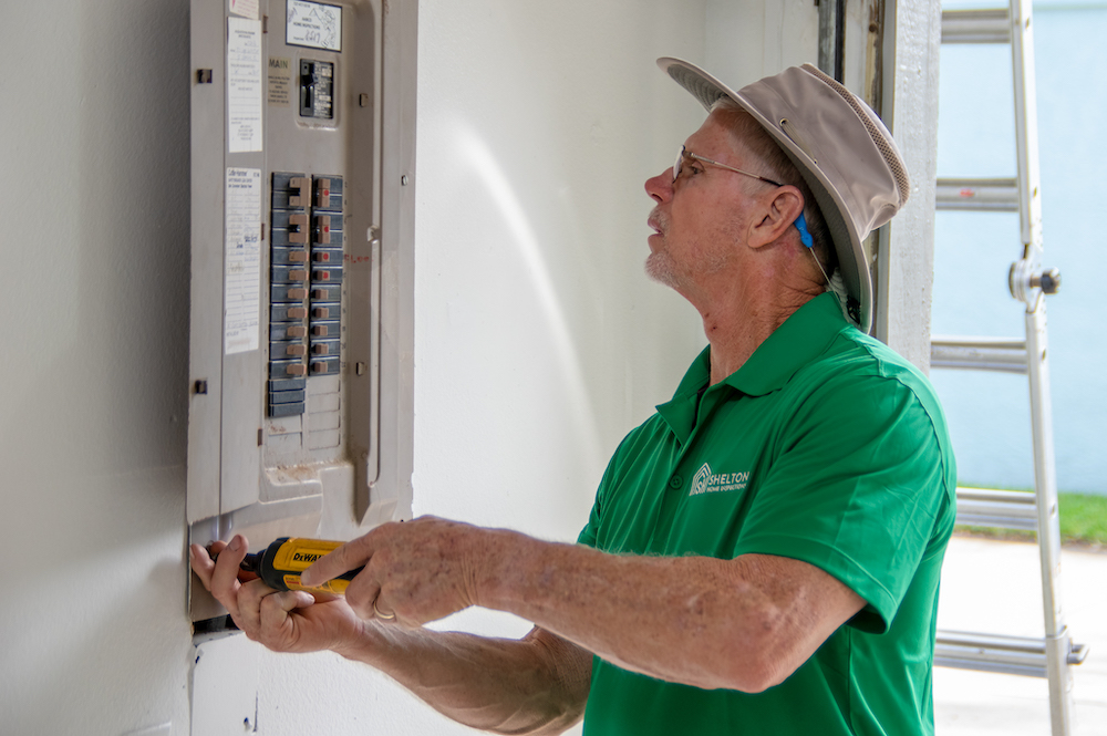 Inspector viewing electric panel